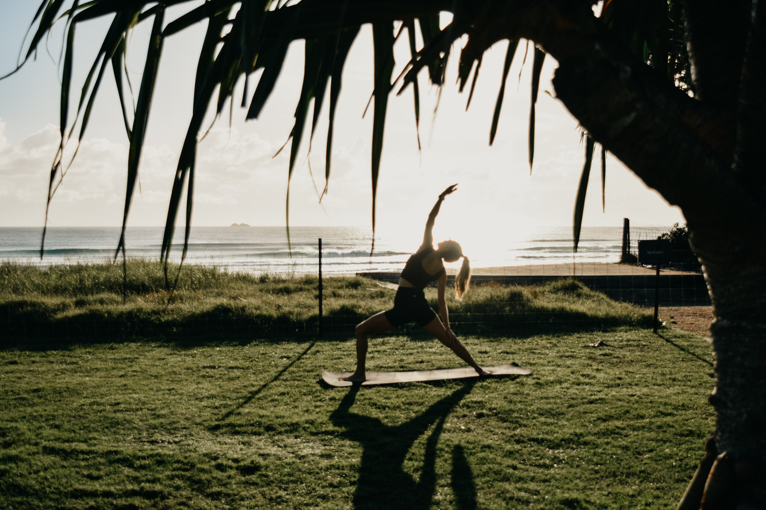 Sunrise yoga overlooking the beach