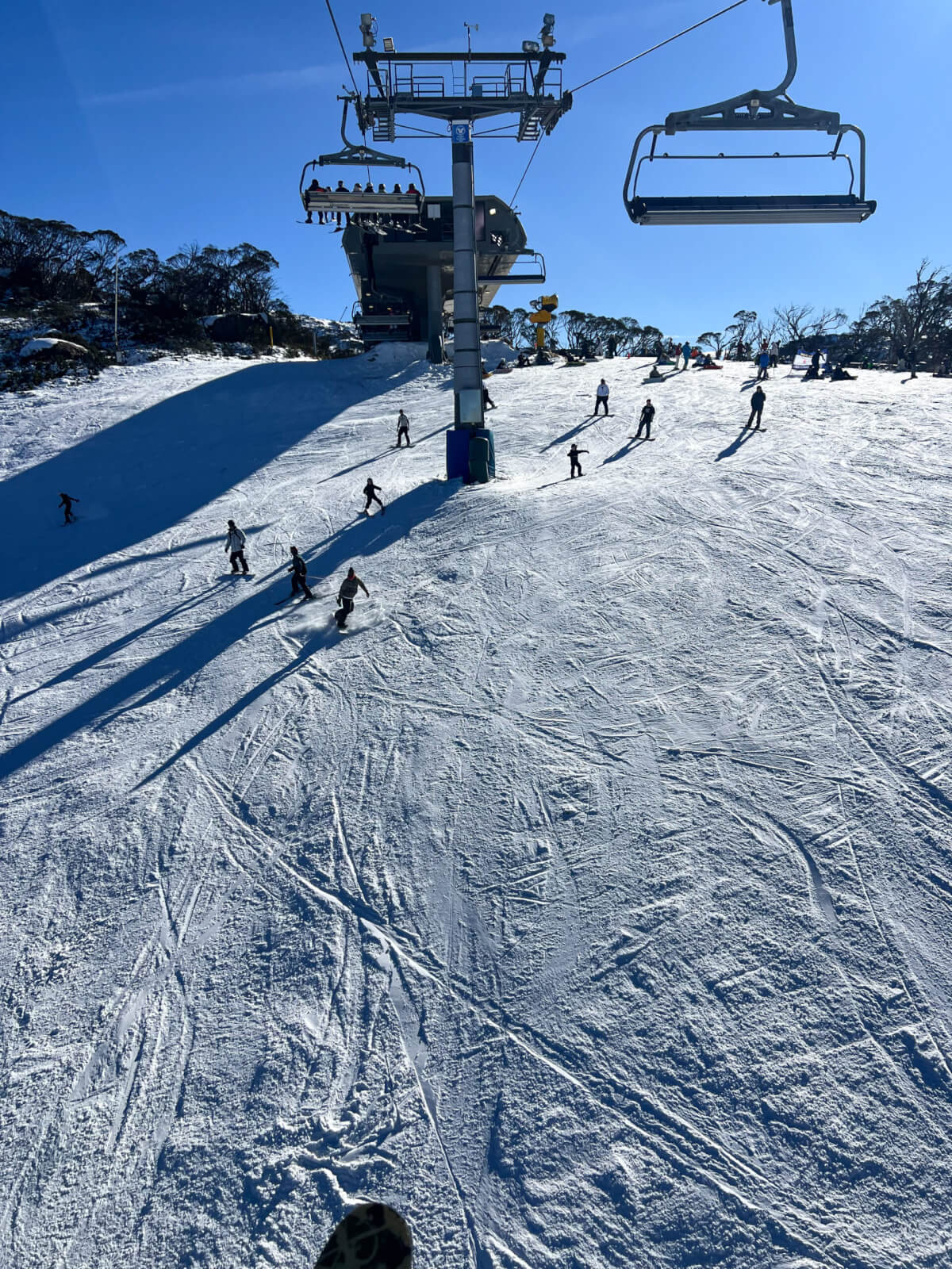 Riding the Village 8 Express chairlift