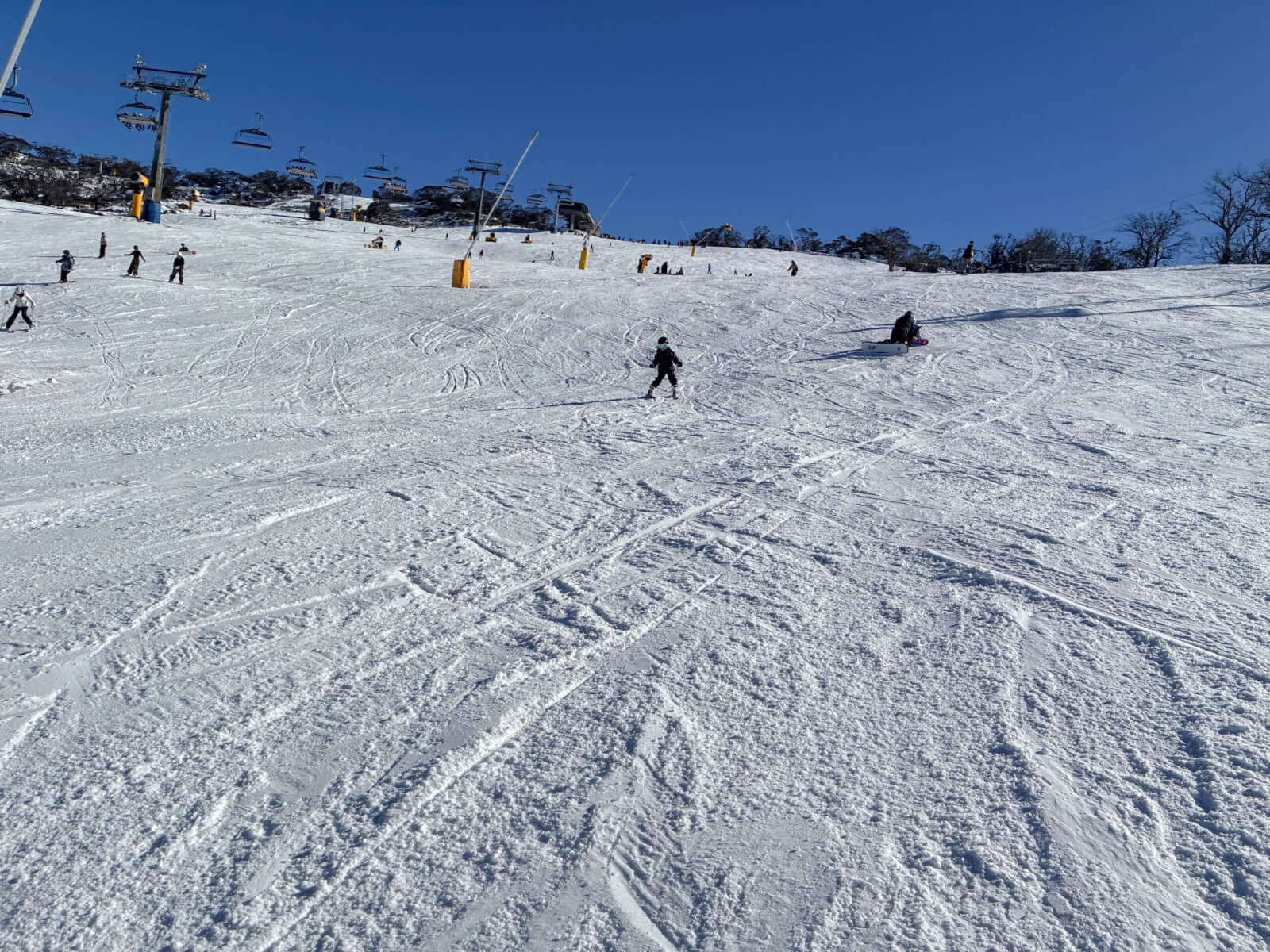 My son skiing down the mountain